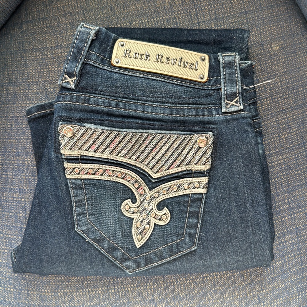 Rock Revival Blue Boot Cut Jeans with Decorative Studs